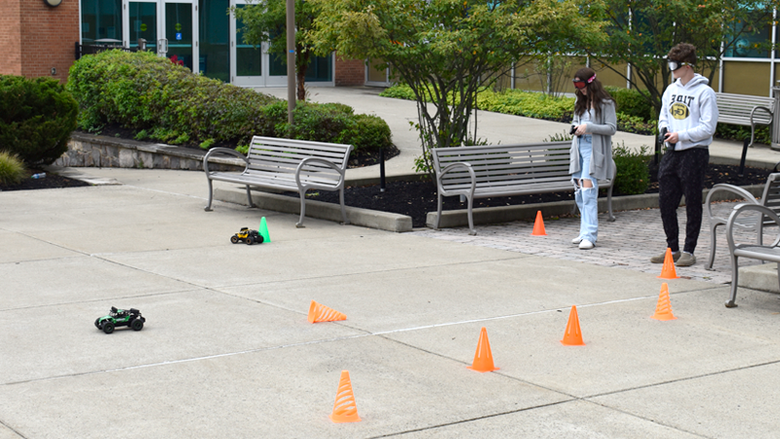 Students wear intoxication goggles and attempt to navigate an RC course to experience the effects of alcohol and other drugs.