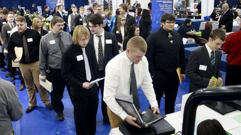 Students, alumni and community members get registered for the career fair at a previous year’s event