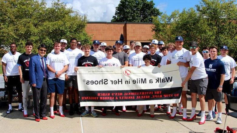 Participants from Penn State DuBois gathered for a group photo prior to “Walking a Mile in Her Shoes”.