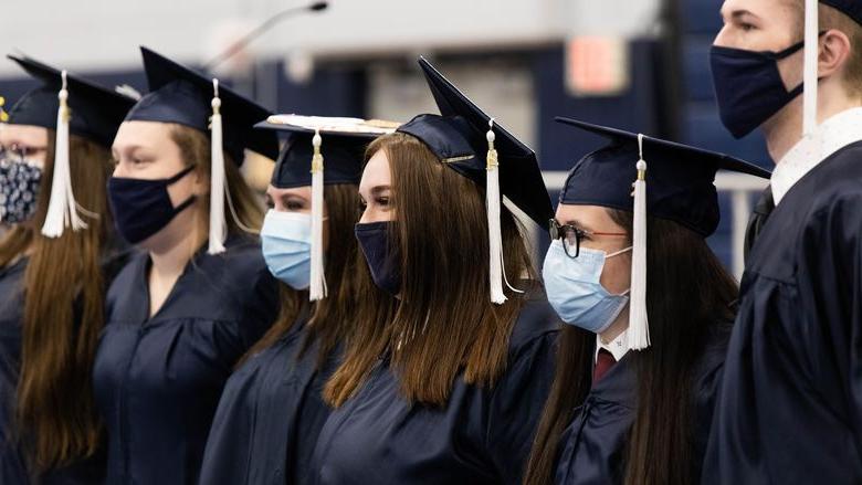 Graduates pose for photo